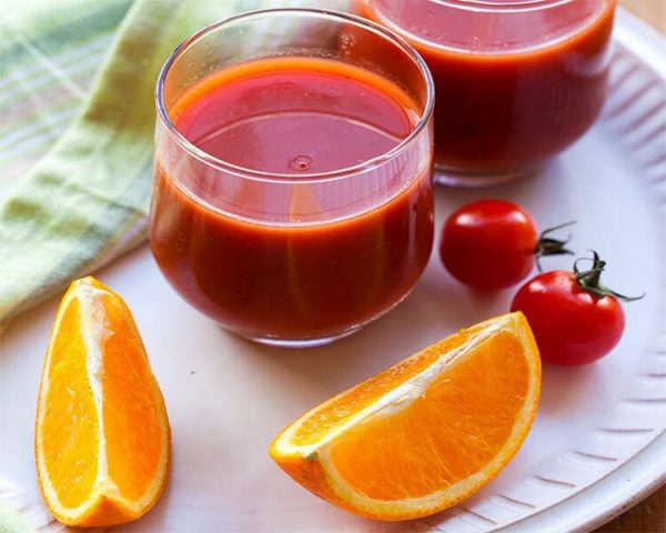Mẹo làm đẹp bằng nước ép cà chua kết hợp với cam